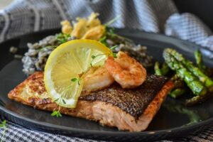 Healthy toppings and sauces to enhance the flavor of baked salmon